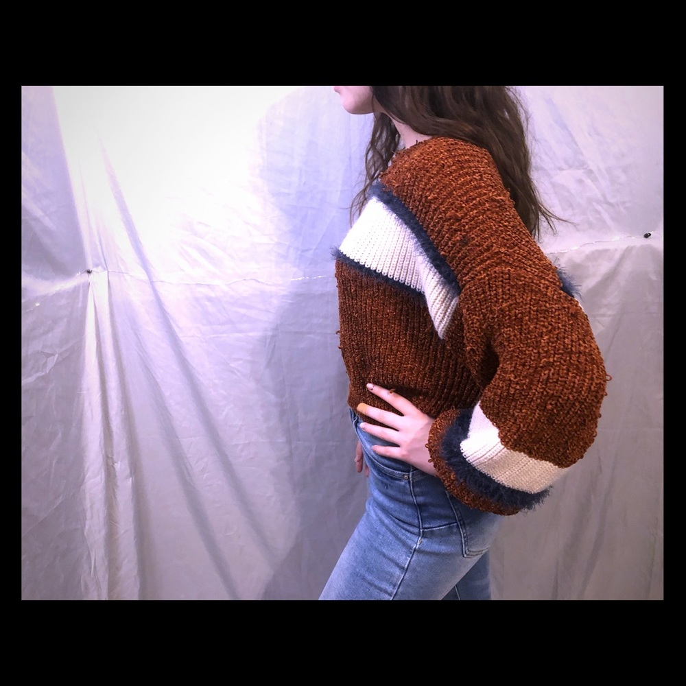 Distressed style knitted sweater